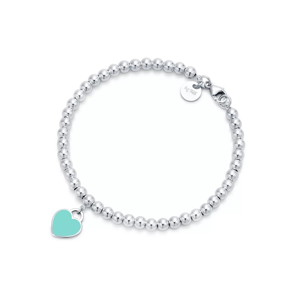 Tiffany & Co. Silver Bracelet with Blue Heart Charm